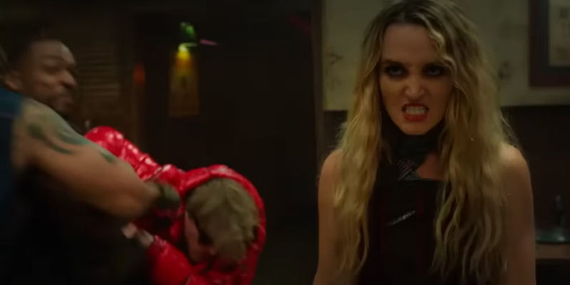 Twisted Metal Season 1: Mary and John in the Milkman's bar brawl. Mary grimaces her teeth. 