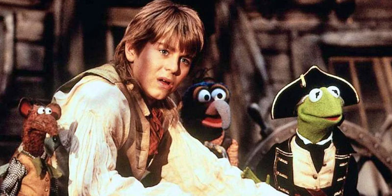 Kevin Bishop as human Jim Hawkins with Muppets in Muppet Treasure Island
