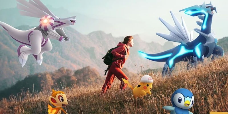 A key visual for Pokemon GO showing a person climbing a hill with several Pokemon including Pikachu, Chimchar, Piplup, Dialga, and Palkia.