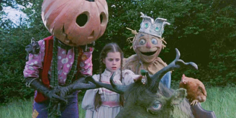 Dorothy standing with Jack Pumpkinhead, Scarecrow and two animals in Return to Oz