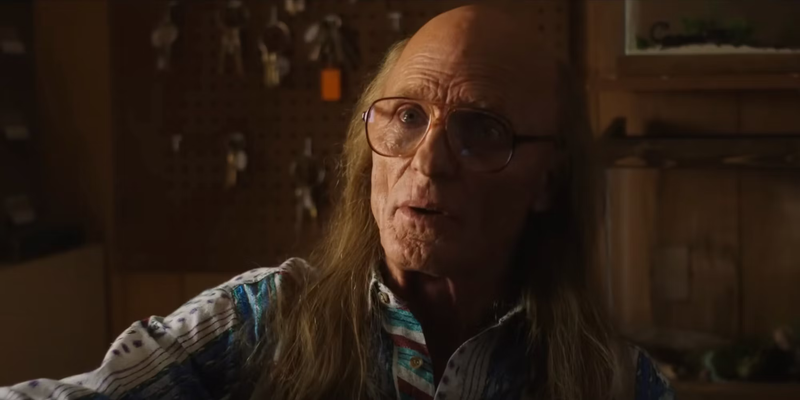 Ed Harris assessing Katy O'Brian at his job in Love Lies Bleeding