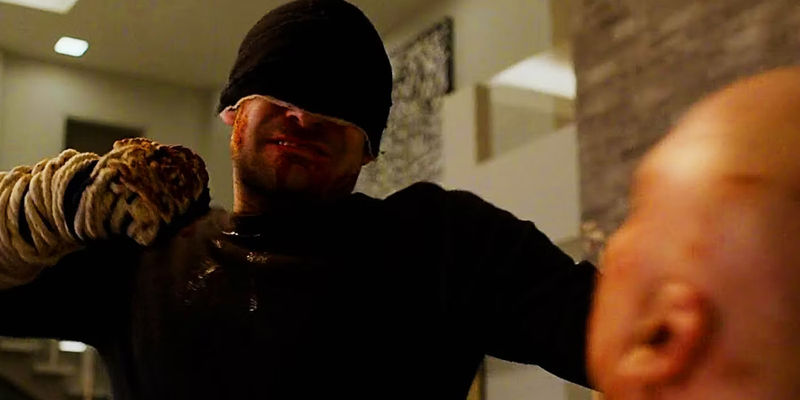 Daredevil beating up Kingpin in Daredevil season 3