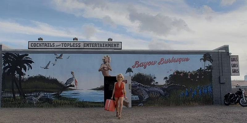 Brittany Snow as Bobby-Lynne exits her workplace in a scene from X.