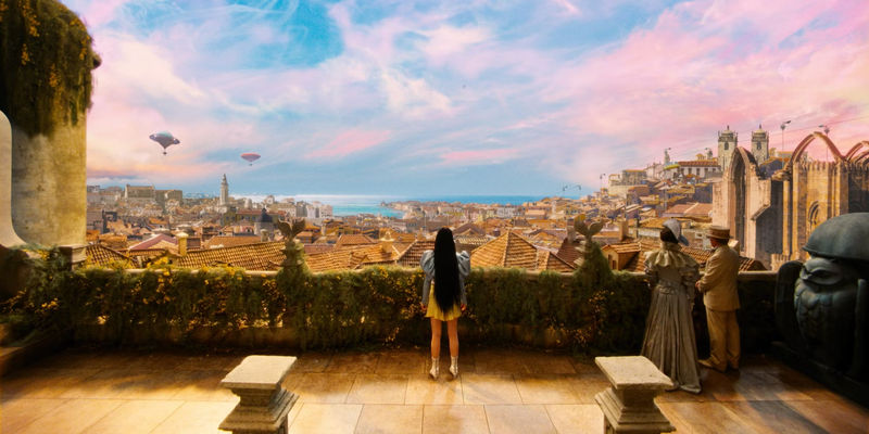 emma stone stares into the distance in poor things