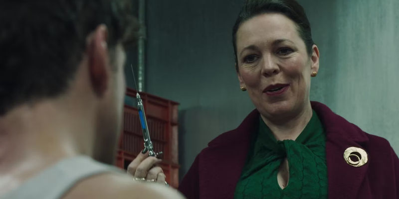 Olivia Colman as Sonya Falsworth looking amused and holding a needle in Secret Invasion Season 1 Episode 2