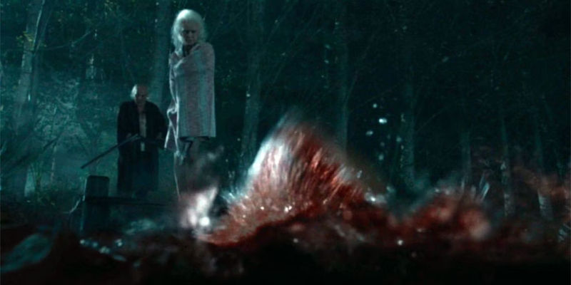 Stephen Ure as Howard and Mia Goth as Pearl watch Brittany Snow as Bobby-Lynne get devoured by an alligator in a scene from X.