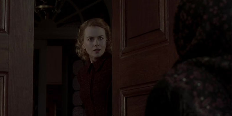 Grace answers her door in The Others-1