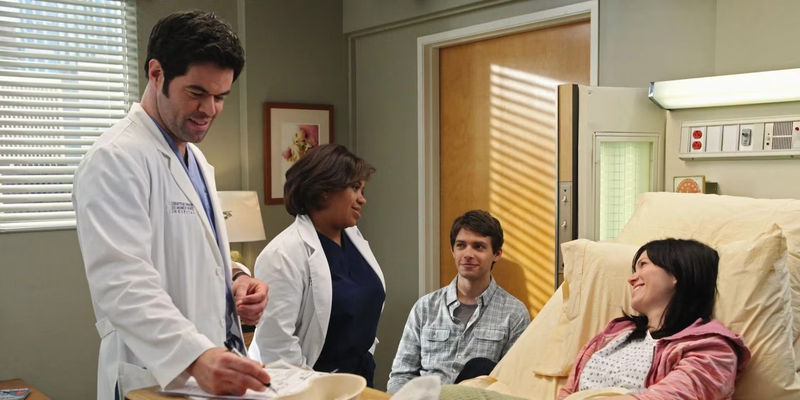 Mary Portman Sitting In Hospital Bed In Grey's Anatomy Talking To Her Husband, Bailey & Charles Percy.jpg