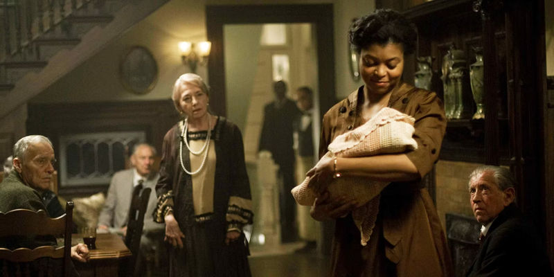 Queenie holding the baby in The Curious Case of Benjamin Button.