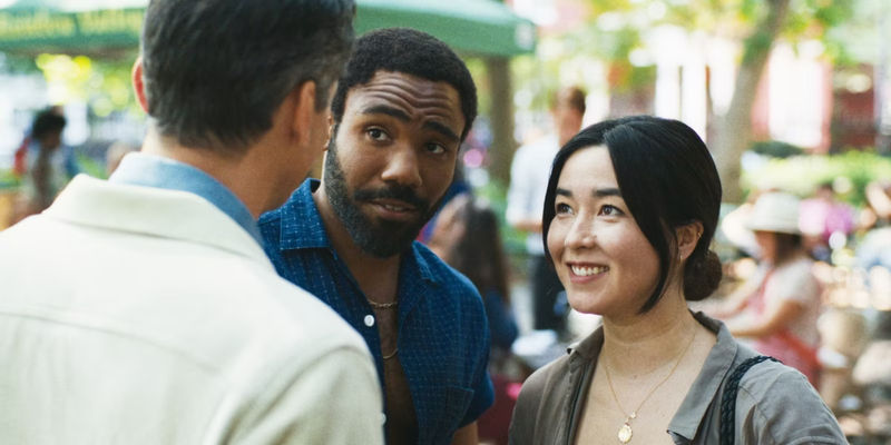 Jane and John talking and smiling with Other John in Mr. & Mrs. Smith