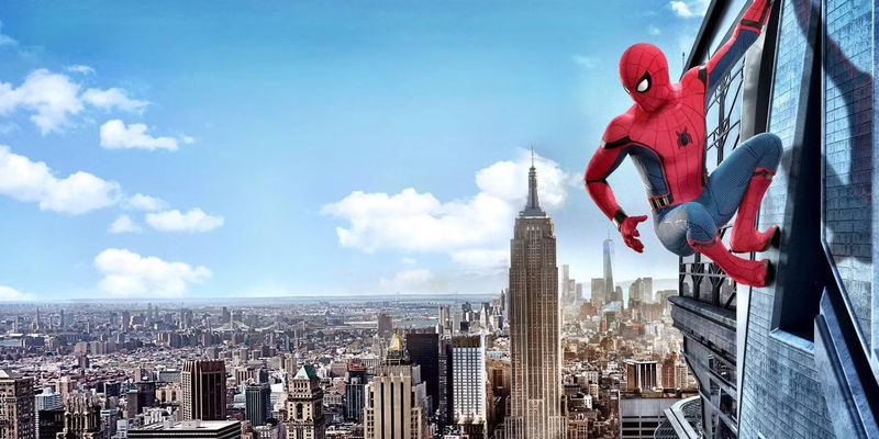 spider-man hangs from a building in Far From Home