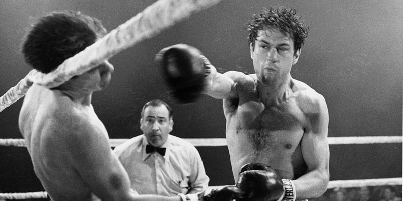 Robert De Niro as Jake LaMotta fighting in the ring in Raging Bull