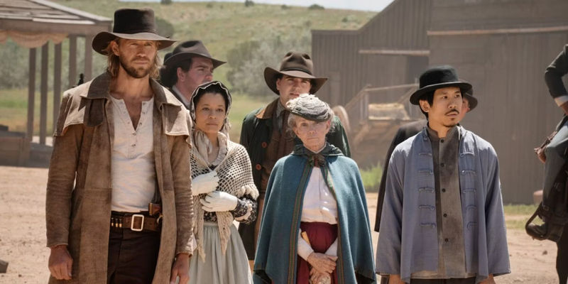 The people of Independence standing around after the shootout in the Walker Independence finale.