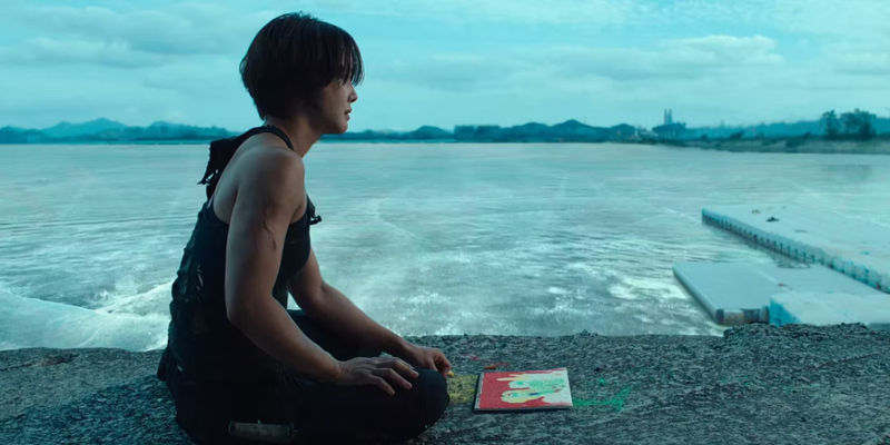 Yi-kyung sitting alone in Sweet Home season 2, episode 8