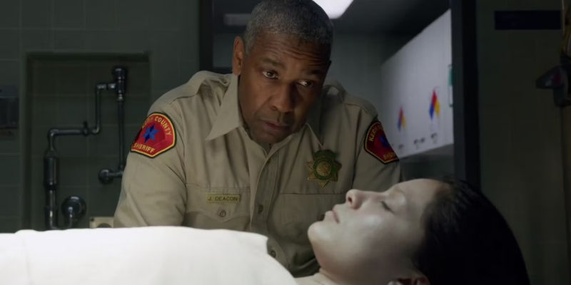 Deacon (Denzel Washington) talking to the corpse of Mary Roberts in The Little Things