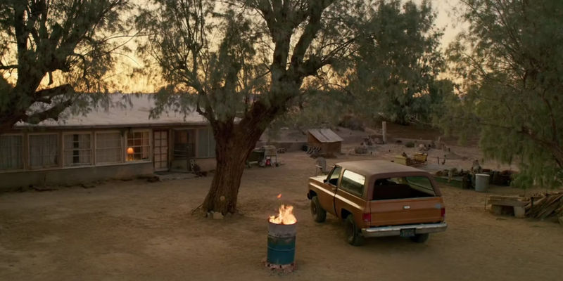 Deacon's (Denzel Washington) truck next to a barrel on fire in The Little Things.