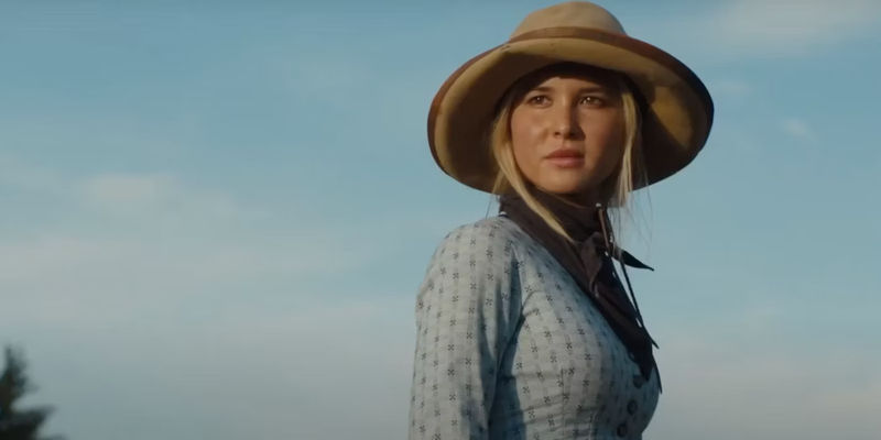 Elsa Dutton wearing a hat and looking into the distance in 1883