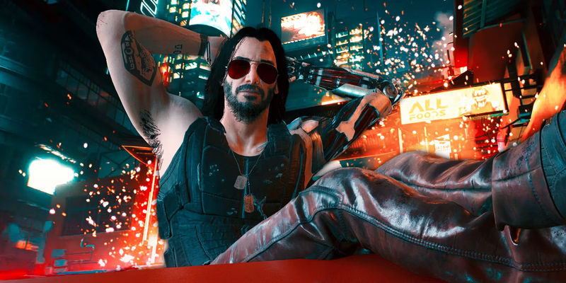 Keanu Reeves as Johnny Silverhand reclines in his chair in Cyberpunk 2077.