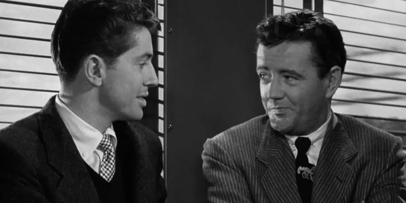 Bruce and John talking in Strangers on a Train