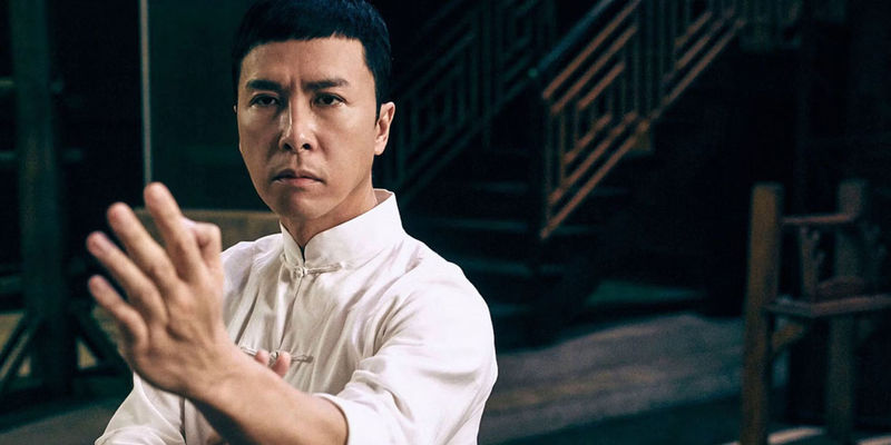 Donnie Yen adopting a Wing Chun stance as the legendary Ip Man
