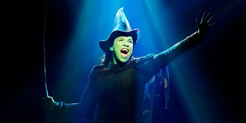 Elphaba with arms outstretched during 