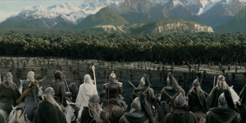 Soldiers watch as the Uruk-Hai retreat in Lord of the Rings 