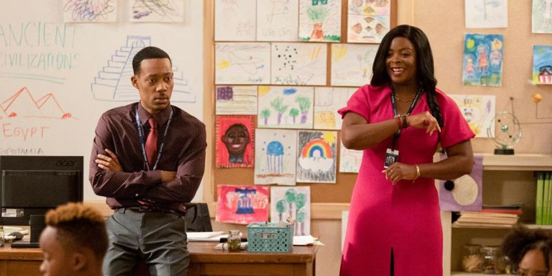 Gregory (Tyler James WIlliams) and Principal Ava (Janelle James) speak to Gregory's class in Abbott Elementary.