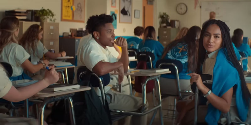 high school kids sit in classroom chairs in Suncoast