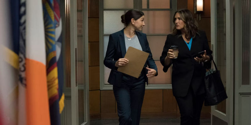 Kat (Jamie Gray Hyder) walking through a hallway in Law & Order SVU