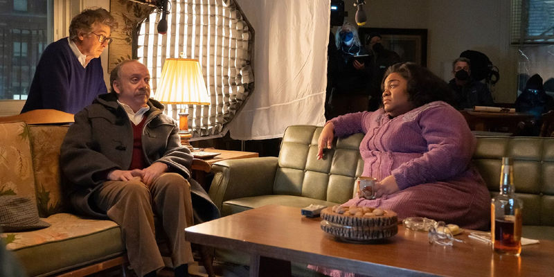 The Holdovers' Paul Giamatti and Davine Joy Randolph sitting on a couch