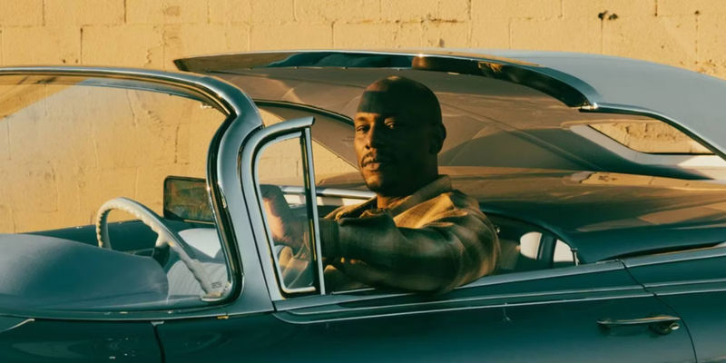 Tootie (Tyrese Gibson) driving in covertible in Bosco