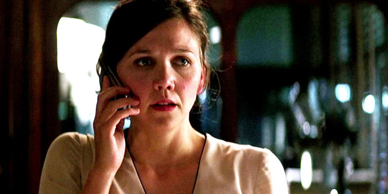 Maggie Gyllenhaal as Rachel Dawes on the phone in The Dark Knight