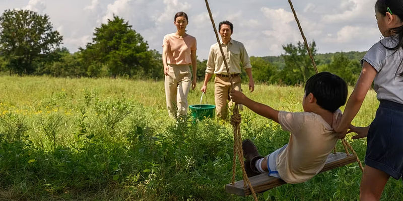 Minica and Jacob with David swinging.