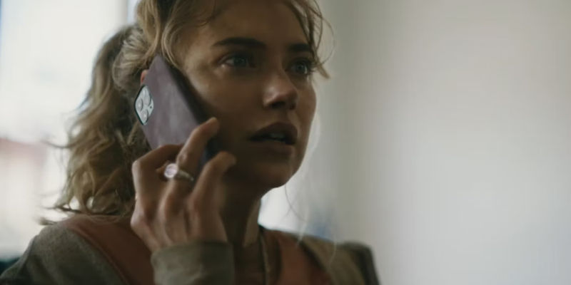 Autumn (Imogen Poots) talking on the phone and looking worried in Outer Range