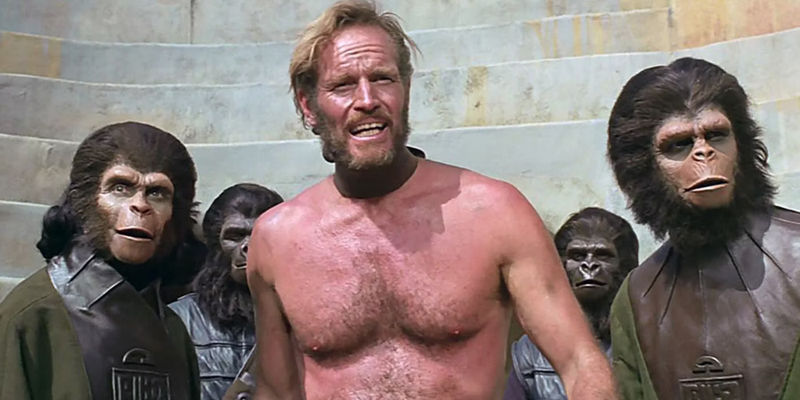 Taylor (Charlton Heston) held captive by Apes in the original Planet of the Apes 