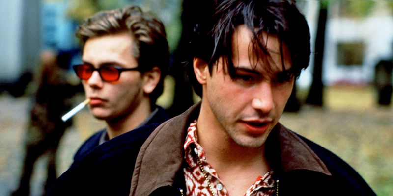 River Phoenix smoking a cigarette and Keanu Reeves in My Own Private Idaho
