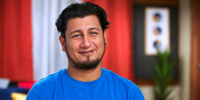 Manuel 90 Day Fiance season 10 in blue shirt