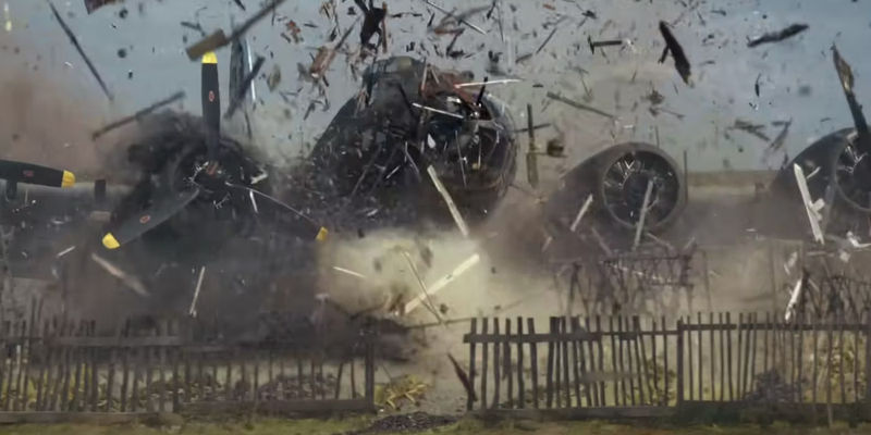 A bomber bursts through a fence in Masters of the Air