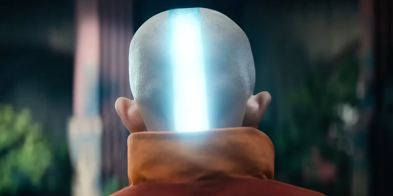 Aang from behind with a glowing line on his head in the new live action Avatar The Last Airbender trailer
