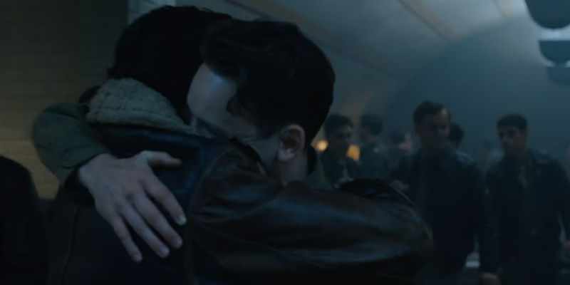 Louis Greatorex and Anthony Boyle as Bubbles Payne and Harry Crosby Hugging Masters of the Air