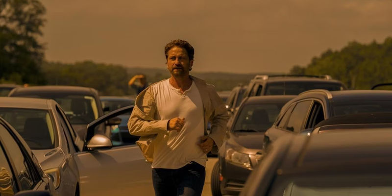 Gerard Butler runs in Greenland
