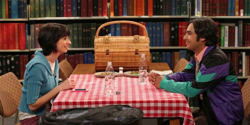 Raj and Lucy on their first date, a picnic in a library, in The Big Bang Theory