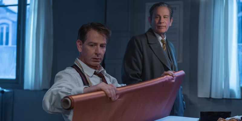 Christian Dior Holding Fabric While Lucien Lelong Watches Him In The New Look