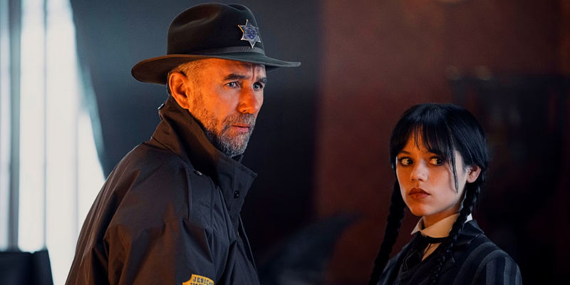 Jamie McShane as Sheriff Donovan Galpin and Jenna Ortega as Wednesday Addams in Wednesday