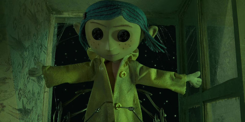 Coraline's iconic button-eyed doll form.