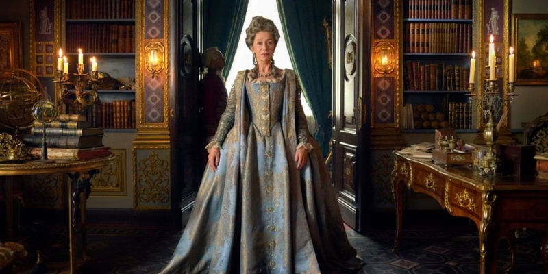 Helen Mirren as Queen Elizabeth I in a blue gown.