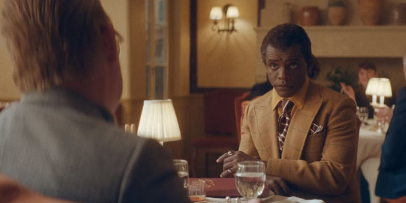 Chris Chalk As James Baldwin Having Lunch With Truman In Feud: Capote Vs. The Swans.jpg