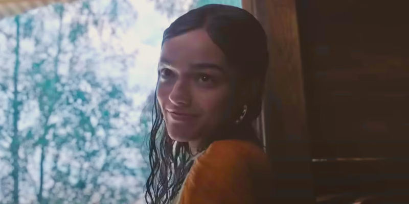 Lucy smiling in The Hunger Games The Ballad of Songbirds and Snakes - Unveiling the Missing Link