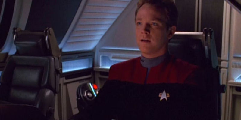 Tom Paris (Robert Duncan McNeill) sits in a shuttlecraft looking forward in the Star Trek: Voyager episode 'Threshold' - Tom Paris’ Emotional Journey Is Star Trek: Voyager 'Threshold's' Greatest Strength
