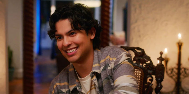 Miguel Diaz smiling in Cobra Kai